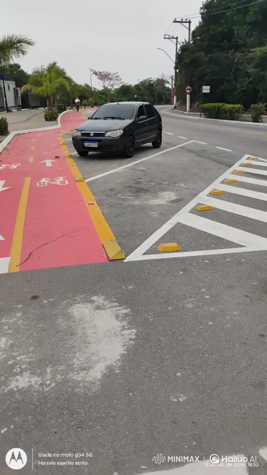 Black Hatchback Lowering Its Suspension at Intersection – AI Generated Video | Hailuo AI