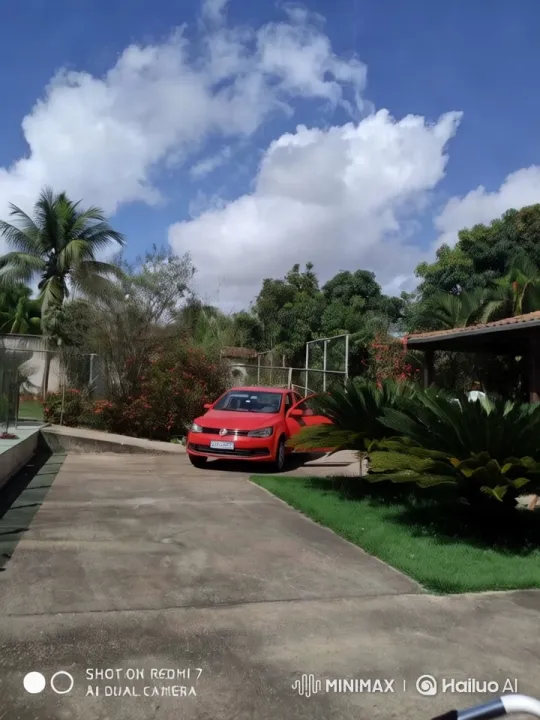 Vibrant Car in Serene Garden Setting – AI Generated Video | Hailuo AI