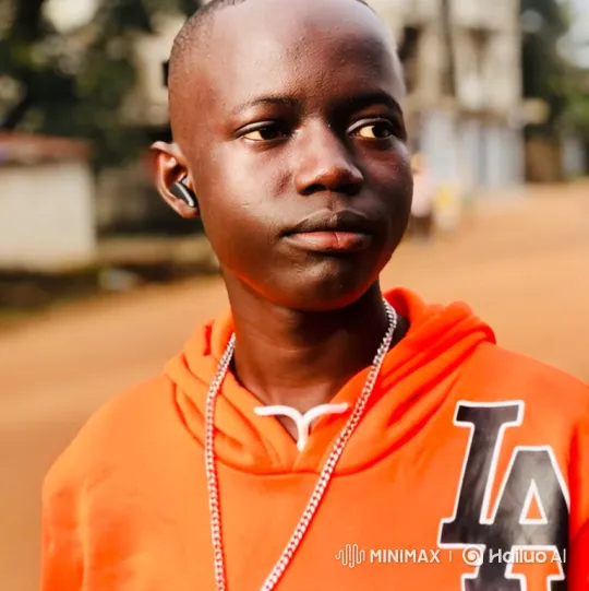Young Man's Contemplative Expression Evolves into a Genuine Smile – AI Generated Video | Hailuo AI