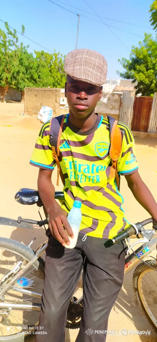 Young Black Man Prepares for Bike Ride – AI Generated Video | Hailuo AI