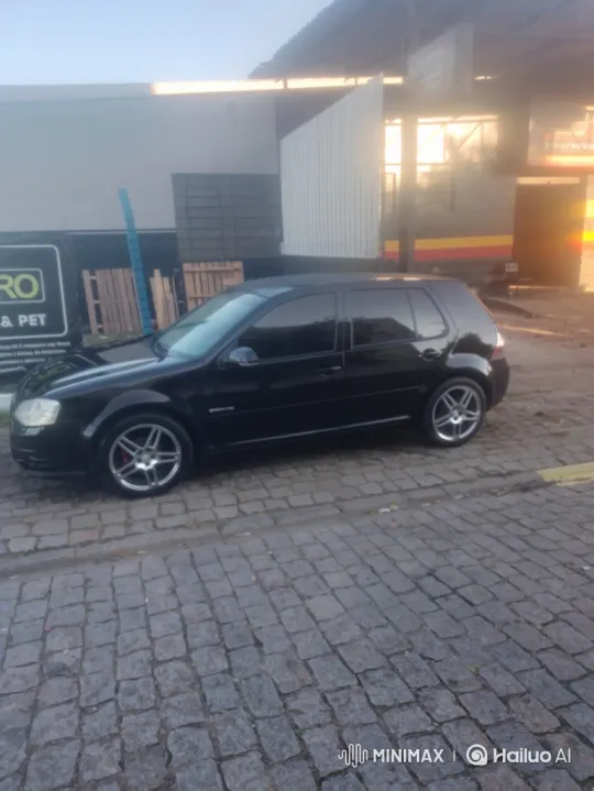 Black Hatchback Lowers on Cobblestone Street – AI Generated Video | Hailuo AI