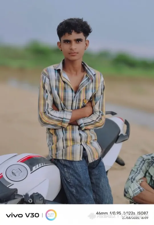 Young Man Reflects by Motorcycle in Nature – AI Generated Video | Hailuo AI