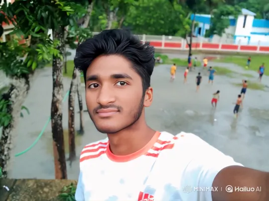 Young Man in Serene Landscape with Gentle Smile – AI Generated Video | Hailuo AI