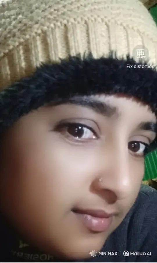 Close-up of a Person with a Gentle Smile and Soft Gaze – AI Generated Video | Hailuo AI