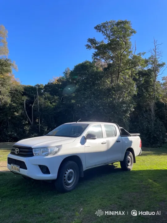 White Pickup Truck Demonstrates Air Suspension System – AI Generated Video | Hailuo AI