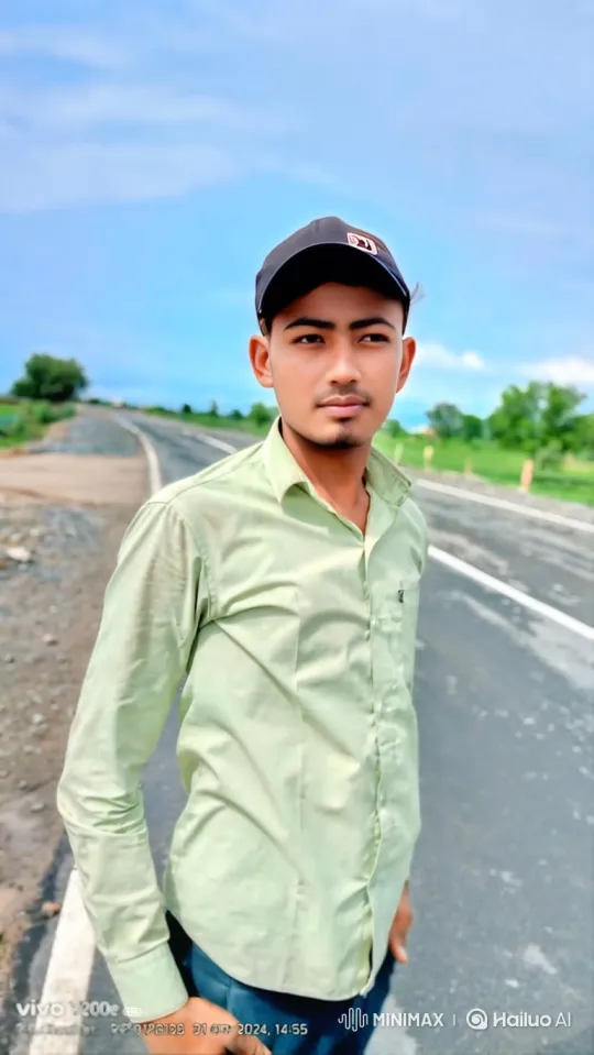 Young Man Reflects on a Quiet Road Under a Wide Sky – AI Generated Video | Hailuo AI