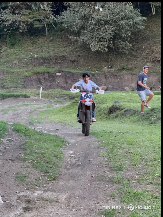 Young Boy Rides Dirt Bike on Professional Track – AI Generated Video | Hailuo AI