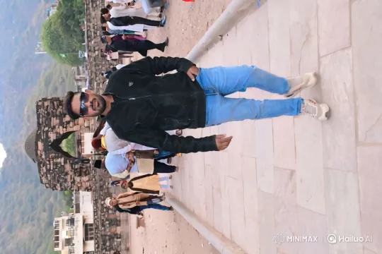 Man Stands at Historic Site with Expansive View – AI Generated Video | Hailuo AI