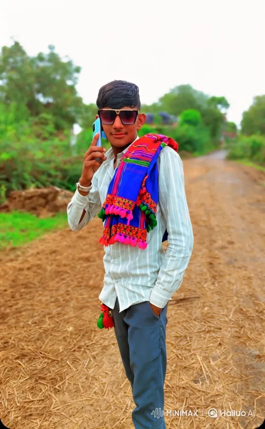 Young Man on Rural Path in Phone Conversation – AI Generated Video | Hailuo AI