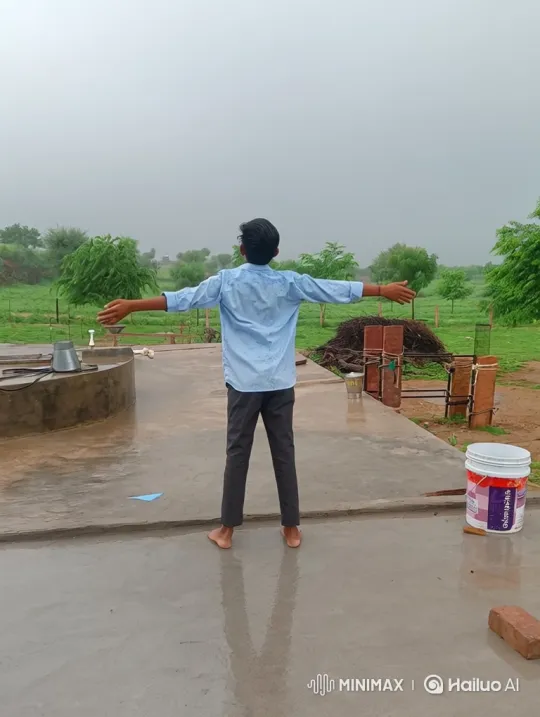 Young Man Embraces Rainy Landscape – AI Generated Video | Hailuo AI