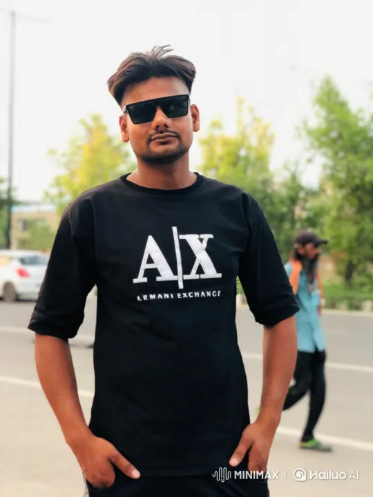 Young Man in 'A|X ARMANI EXCHANGE' Shirt Stands Confidently – AI Generated Video | Hailuo AI