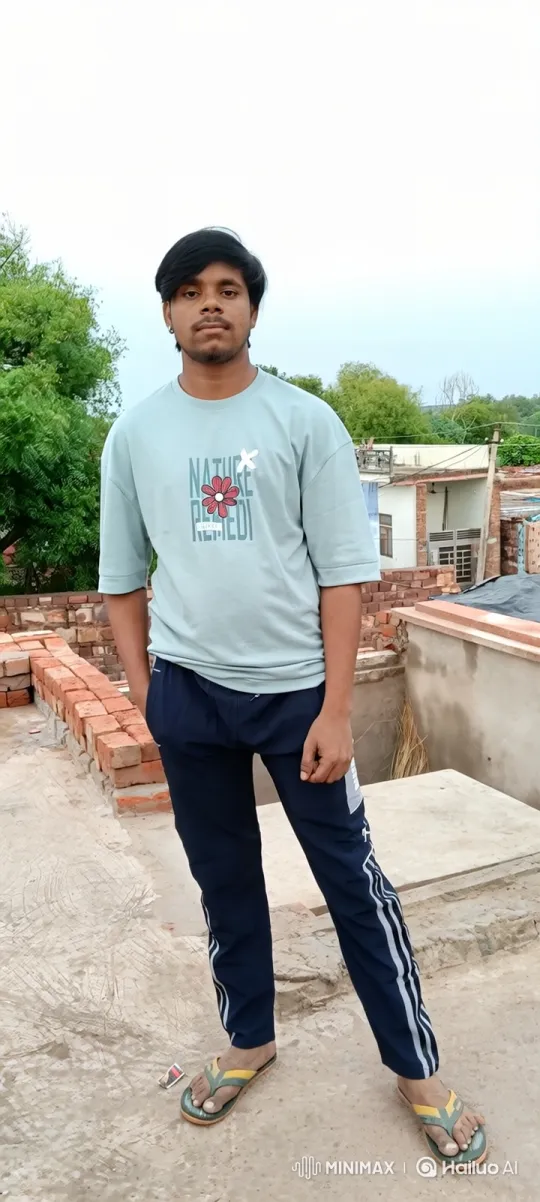 Young Man on Rooftop: A Moment of Calm – AI Generated Video | Hailuo AI