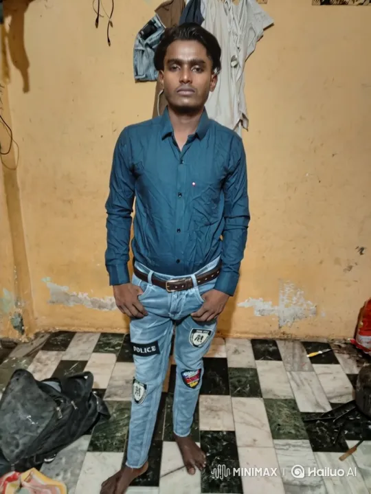 Young Man in Checkered Room Stares Steadily – AI Generated Video | Hailuo AI
