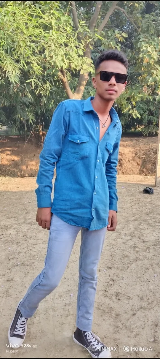 Young Man Poses Outdoors, Flashes Confident Smile – AI Generated Video | Hailuo AI