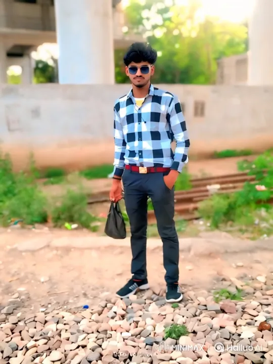 Young Man in Checkered Shirt Walks Towards Camera – AI Generated Video | Hailuo AI