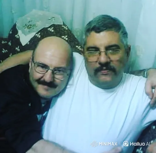 Warm Embrace Between Two Middle-Aged Friends – AI Generated Video | Hailuo AI