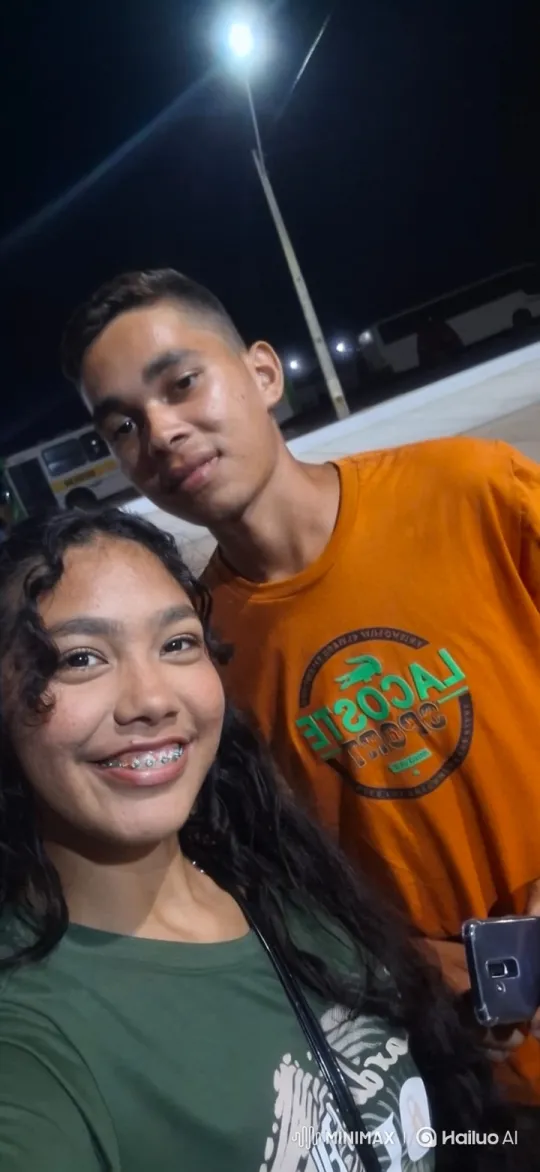 Young Couple Sharing a Sweet Kiss Under Streetlight – AI Generated Video | Hailuo AI