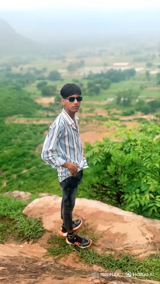 Young Man Pilots Helicopter Over Misty Valley – AI Generated Video | Hailuo AI