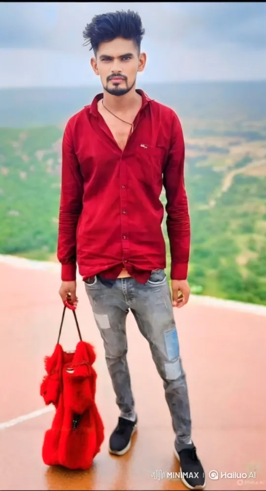 Young Man in Red Shirt Stands Confidently Outside – AI Generated Video | Hailuo AI