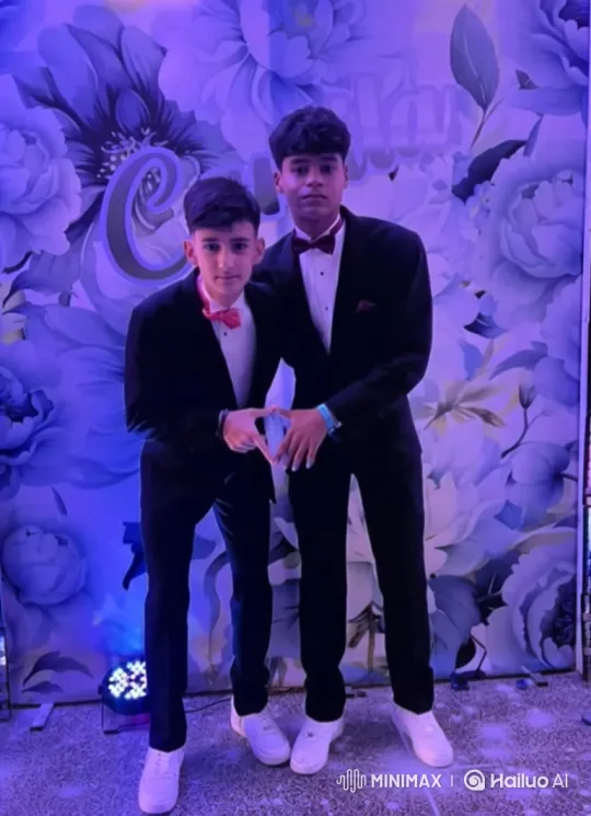 Two Men Share Intimate Kiss in Formal Suits – AI Generated Video | Hailuo AI