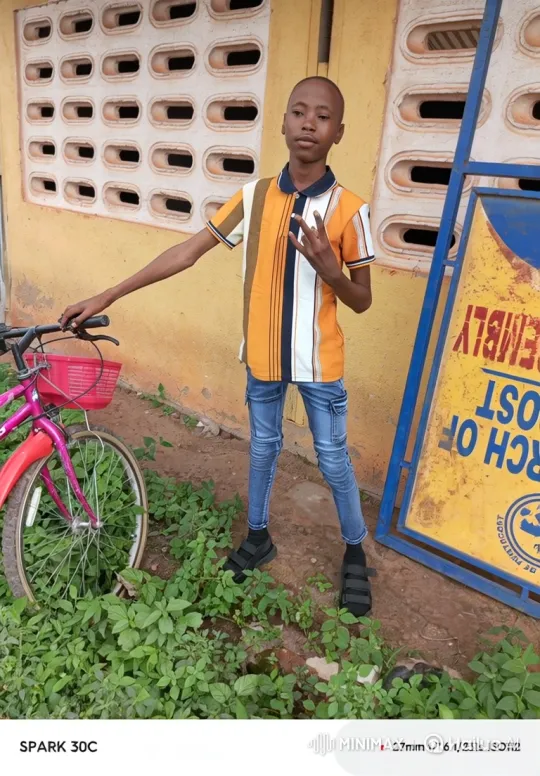Young Person Poses with Pink Bicycle – AI Generated Video | Hailuo AI