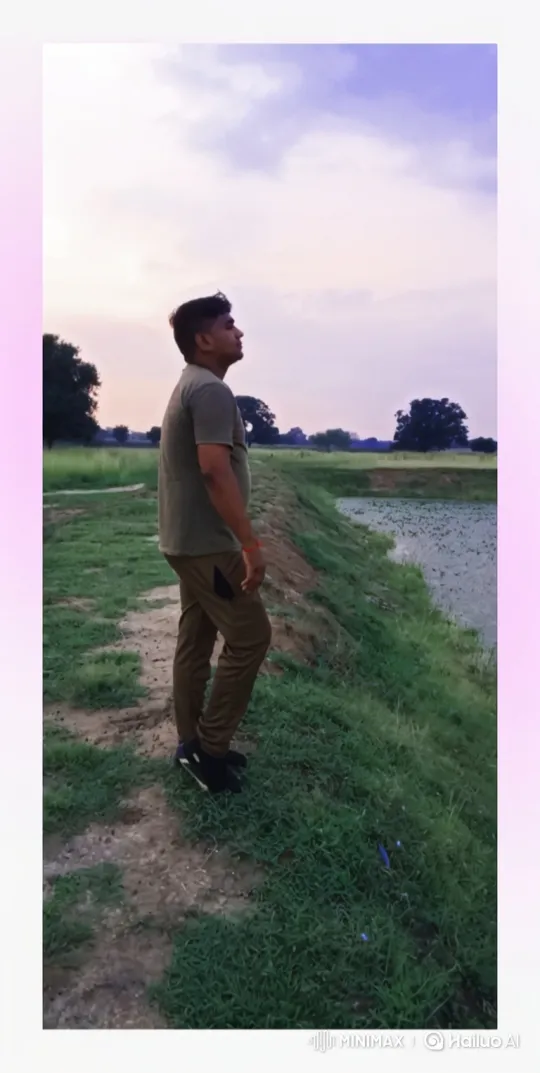 Young Man Reflects by Twilight Pond – AI Generated Video | Hailuo AI