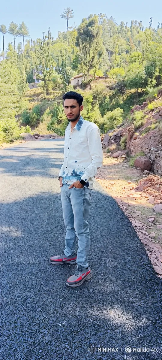 Young Man Walking Down a Curving Road in Nature – AI Generated Video | Hailuo AI