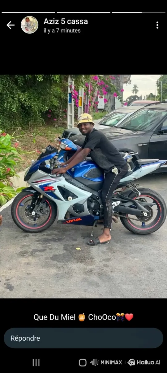 Man Prepares to Ride Suzuki Motorcycle in Outdoor Setting – AI Generated Video | Hailuo AI