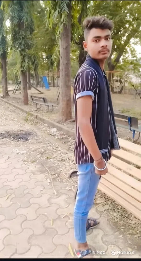 Young Man Walking in Park with Tracking Camera – AI Generated Video | Hailuo AI