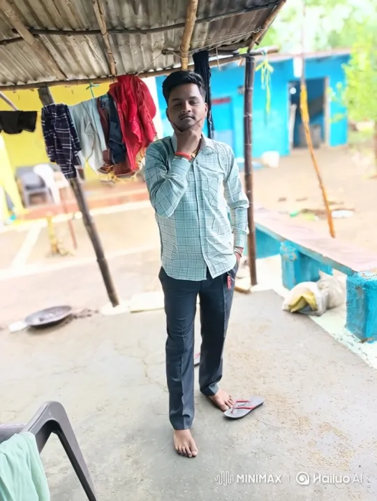 Young Man Poses Thoughtfully on Patio – AI Generated Video | Hailuo AI