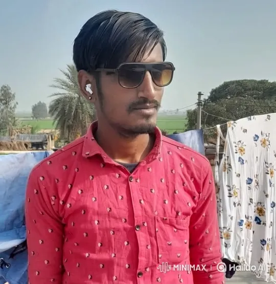 Contemplative Young Man in Hazy Day Landscape – AI Generated Video | Hailuo AI