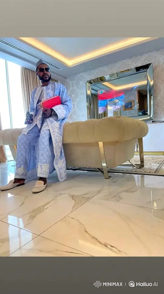 Man in Luxury Setting Reads Book on Floor – AI Generated Video | Hailuo AI