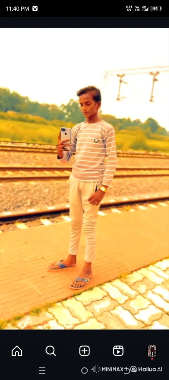 Young Man Preparing to Take a Selfie on Railway Platform – AI Generated Video | Hailuo AI
