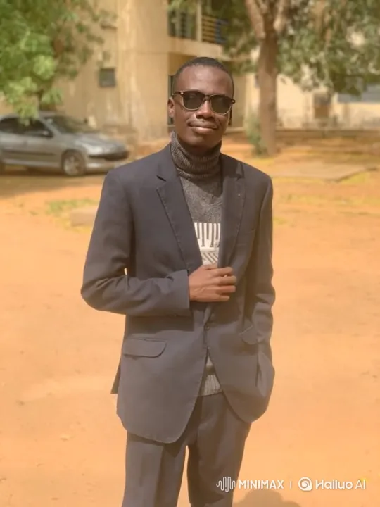 Stylish Man Poses Outdoors with Confident Demeanor – AI Generated Video | Hailuo AI