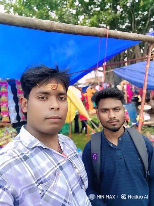 Two Friends Pose for a Selfie at a Vibrant Festival – AI Generated Video | Hailuo AI