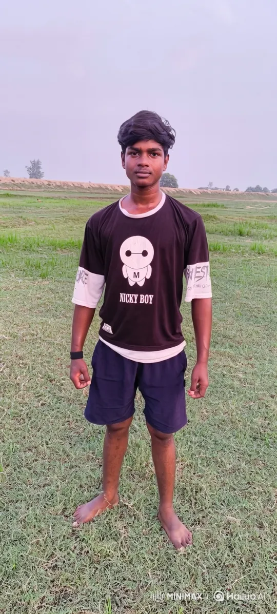 Young Man Initiates Slow Walk in Grass Field – AI Generated Video | Hailuo AI