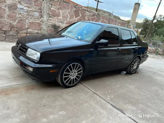 Black Sedan with Custom Wheels Lowers Chassis – AI Generated Video | Hailuo AI