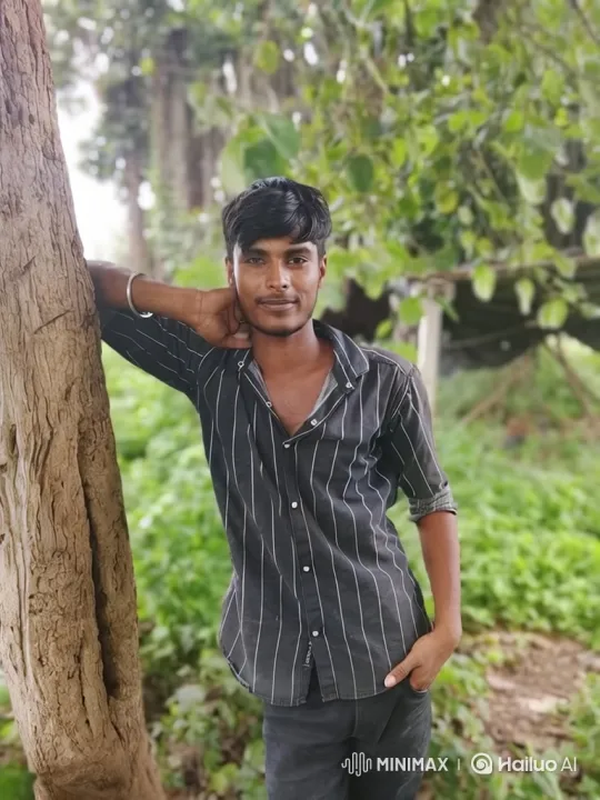 Young Man in Lush Forest, Steady Tracking Shot – AI Generated Video | Hailuo AI