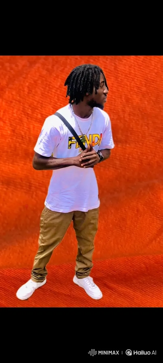 Young Man in White Tee looking at the camera, camera zoom in – AI Generated Video | Hailuo AI