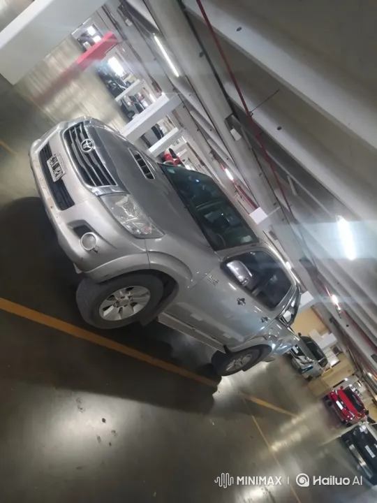 Silver Pickup Truck Lowering in Parking Garage – AI Generated Video | Hailuo AI
