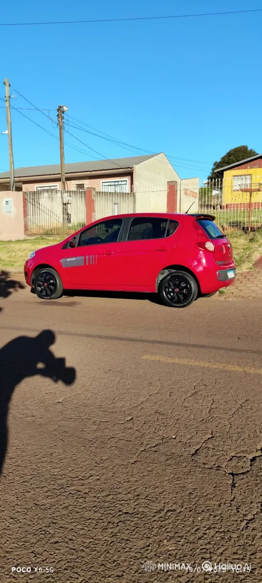 Red Hatchback Lowering Its Suspension on Sunny Day – AI Generated Video | Hailuo AI