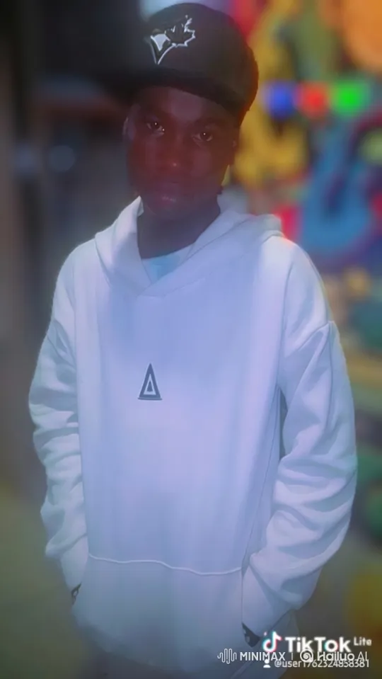 Young Person in White Hoodie with Camera Movement Study – AI Generated Video | Hailuo AI