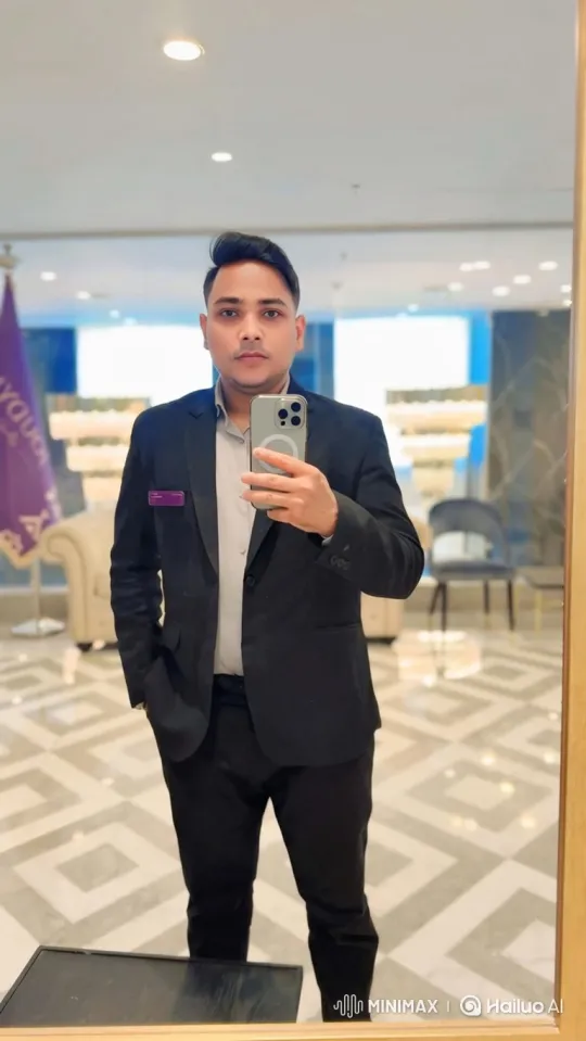 Luxury Hotel Lobby: Man in Suit and Woman in Abaya Reflect Shared Elegance – AI Generated Video | Hailuo AI