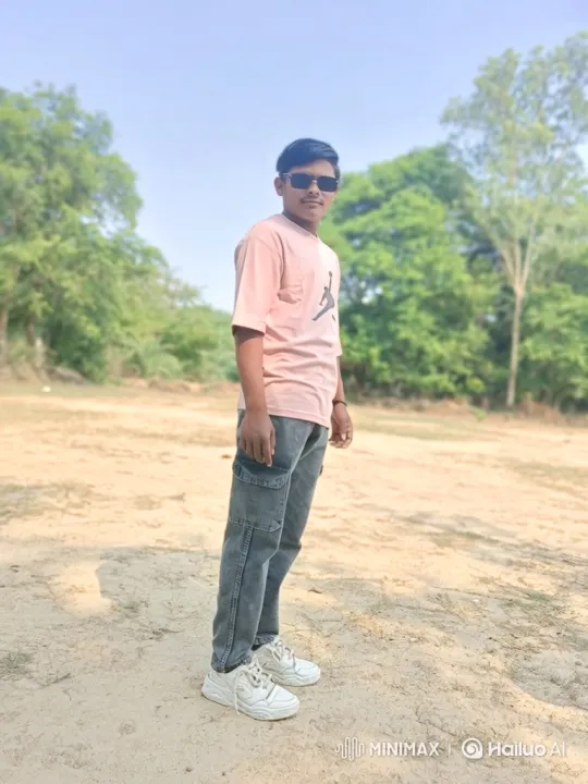 Young Man in Pink Shirt Stands Still in Sunny Clearing – AI Generated Video | Hailuo AI