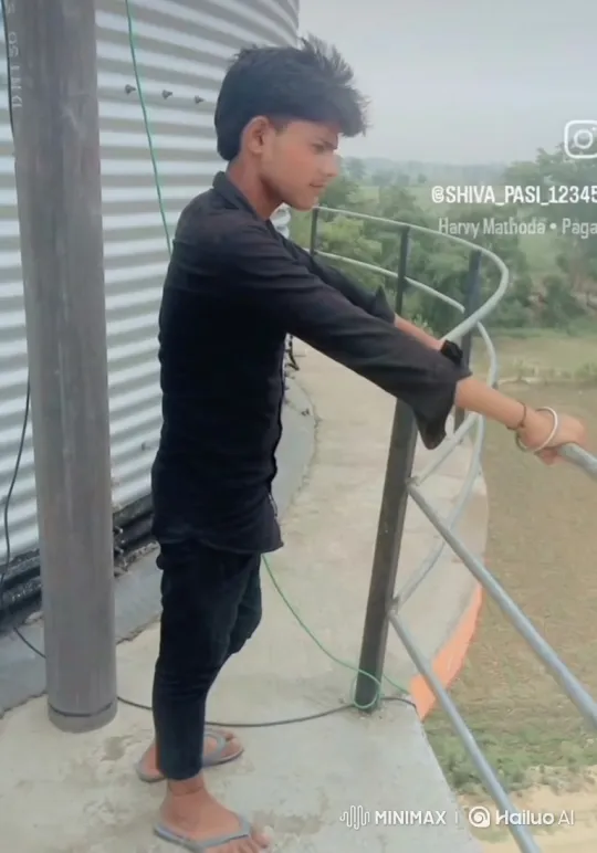 Young Man Contemplates on a High Walkway – AI Generated Video | Hailuo AI