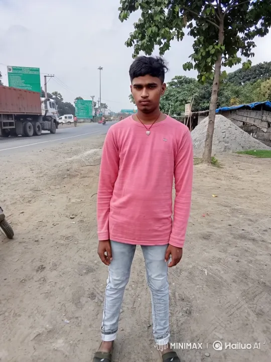 Young Man Stands by Road, Observes Passing Truck – AI Generated Video | Hailuo AI
