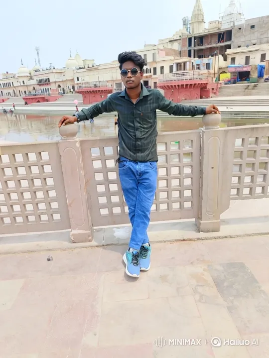 Confident Man Posing on Promenade with Buildings Background – AI Generated Video | Hailuo AI