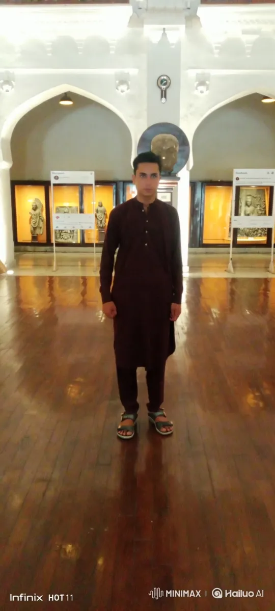 Young Man in Serene Museum Hall – AI Generated Video | Hailuo AI