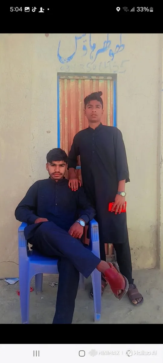 Two Men Pose Steadily in Front of a Wall – AI Generated Video | Hailuo AI