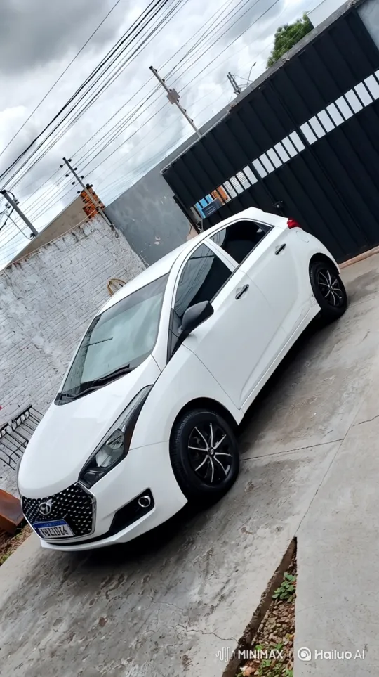 White Hatchback Undergoes Slow, Smooth Air Suspension Lowering – AI Generated Video | Hailuo AI